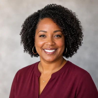 Headshot of Jasmine Carter, Office Manager at Crown Roofing Co. in Atlanta, Georgia.